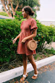 I think this purse enhances every outfit! It's just that little extra something that pulls everything together and I love it so much! The only thing is the inside has a very weird strong smell. But I just coated it in perfume and that seemed to do the trick. - Miranda F.