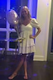 The dress fits true to size and has a bit of a boxy feel, but I expected that based off the style. Loved it for my bachelorette party as an extra outfit! - Danielle W.