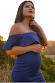 Fits my curves in all the right places. I bought this dress for a maternity shoot. Hugs the baby bump just right and makes a new mama like me feel sexy. - Xompratai S.