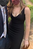 I ordered this for an outdoor, formal wedding and received so many compliments. I'm really glad I read the reviews - if you're between sizes I would recommend sizing down. 
I ordered the M and L. The length of the L was better for me (fully covered my feet even when I walked and could have possibly worn a small heel), but it was too loose everywhere and I didn't want to have to pay for tailoring.
I kept the M and other than being a tiny bit short (I had to wear flats and my feet showed when I walked), it fit perfectly. The material is just thick enough and a little bit stretchy, so it looks tailored right out of the box.
I 100% recommend this dress. - Catherine G.