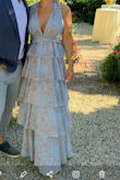 can adjust the straps to have more coverage like some of the photos or make it more open to show cleavage. 
The fullness of the bottom half and the more exposed top really make this dress great.
Intimate wedding, went to a bar afterward the cocktail reception. Had lots of strangers coming up to me to tell me how cute the dress is.
More of a "OMG I LOOOOVE YOUR DRESS WHERE DID YOU GET IT!?" kind of thing.
Was nice at first then got a little annoying. 
Dress should come with business cards to the website to handout with it.
Overall 10/10. Recommend. - Sarah C.