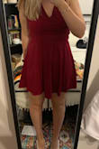 This dress is adorable and very well made. I sized up to a large (I'm usually a medium) since I have an athletic build and a wider ribcage and I was worried about the dress fitting my waist since the material does not stretch. It fits pretty well but it's definitely loose in the bust, which also causes the lower strap that ties into the back bow to flare out a little. It's still cute enough to wear and tying the back super tight/wearing a push up sticky bra did help a little, but it's definitely not a perfect fit. Other than that, I love the dress! - Stephanie R.