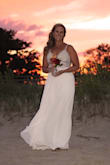 I ordered this dress in a size 10 and 8. The 8 fit better but still needed to have the straps taken in about 2 inches. The dress is light weight and the beading is well done. This dress looks far more expensive than the price tag. Couldn't be happier! Thanks Lulus! - Kelly H.