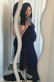 My body stats: 
- 105lbs (original weight), 129lbs (current pregnancy weight)
- Just over 5'2 tall
- Body Type: Gamine (??) 

I needed something that was bump friendly, and this came through. I might need to shorten it when I get my original body back because my baby bump is lifting the length a bit. I just wish the slits weren't quite as high. However, the slits on both sides break up the long silhouette nicely, which is perfect for shorter girls, especially with the gamine-ish body type. 

If you're looking for a cute dress to layer up in fall, I'd definitely recommend this. - Danielle L.