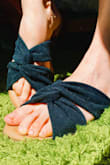 I would have to describe these beauties as simple perfection. When I first put them on, I thought they might be too elegant for me, but let's be honest, who doesn't love looking down and admiring well dressed toes?

They are soft and have a little bit of cushion so it feels as though you are always walking on a soft carpet. The bands are also very soft and adapted to the width of my foot in a couple of days after receiving them.

Thank you for making a lovely shoe! - Arian L.