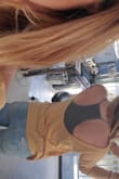 The color to me is more mustard looking than what is pictured. The model has beautiful skin, so maybe it just looks gross on me. It runs large but it still doesn't fall off the shoulders too much. It's comfortable. - Destiny L.