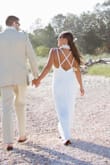 I wore this for my wedding in early September. I LOVED it, once I had it altered. I usually wear a small in Lulus dresses, but sometimes a medium if it's very fitted around the waist or ribcage. I wear a size small in tops, and medium 6/8 in shorts/skirts. I initially ordered a medium, which was huge. I then ordered the small, which fit perfect through the middle but was huge in the chest. Way too big for 36B/small chested ladies! My seamstress was able to take up the straps and take in the bust, as well as hem the bottom - too long for 5'3 and sandals. Her alterations were well worth it for a dress I loved and spent in total less than $120 - my husband said I could have told him it cost thousands! - Audrey M.