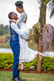 I wore this dress to my wedding on 29th August 2020 in Nairobi, Kenya. I always knew that I wanted an understated yet elegant dress. Most bridal shops in Nairobi sell traditional wedding dresses: puffy ball gowns or mermaid style dresses with a lot going on. Atelier shops are also fairly expensive. I knew I wanted to import an affordable gown then make adjustments to it. I bought this dress in December 2019, and my choice became even more appropriate when I had a small COVID wedding. I didn't really have any qualms about shopping online for this dress and having someone bring it home for me.
The dress fit perfectly. I had to get the bust and arms taken in a little. The back of the dress is the highlight. I had a gold chain attached to the back to draw attention to this area. The only thing I did not like was that the inner layer was longer than the dress. I had it shortened but then I cleaned the dress and the lace shrunk a bit, leaving the inner layer longer. Aside from that, the dress was spectacular! - Ivy M.