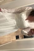 I bought this one and the "awaken my love" dress and I love this one way more. It's silk lined underneath and feels really high quality. The back has see-through lace (like the arms) but I'm wearing a nude bra in the photos and it's not too noticeable. Really happy I took the chance! - Alissa H.