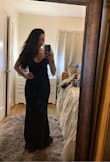 I love this dress, it's super flattering and just the  perfect amount of classy and sexy but there's a whole lot of heavy material involved. I'm a 32D and this was still a bit loose up top. I'm also 5'4" and this was looooooong. I didn't want to have to mess with alterations - so back it went. I do love this dress though, for women just a tad bigger than me. I would recommend sizing down. - Christina H.