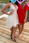 I bought this dress last minute for my bachelorette party and was really happy with the quality of it. I do wish I ordered a size down because it did run a little loose on me and the straps are a little too long with no way to manually adjust them. My mom ended up tying them in the back and tucking it in, and it wasn't noticeable at all so it was an easy quick fix, but could also be altered if you have more time than I did. Over all, I felt very comfortable in this dress and really liked the little sequins on it. - Madalina P.