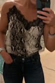 I don't really "dress up" much..I love my leggings and tshirts but this tank immediately caught my eye & I'm so happy I bought it. It's cute, light, & subtly sexy. Can't wait to wear this out! - Abby K.