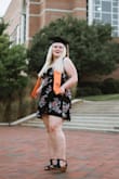 I bought this dress for my graduation pictures! I love that it's a wrap dress but unfortunately it does not love my DDs. Overall I love it. I just had to wear something underneath. - Jessica B.