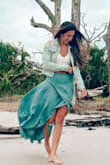 Love how soft and flowy the material is. I do wish it was a little shorter so I could wear it without heels. It's also a tiny bit loose around my waist so it falls a little lower on my hips that the photos. Still love it though! - Natalie Z.