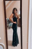 I love this dress!! I usually wear an XS/S and the reviews made me order a S (said it ran small). I'm so glad I ordered a S and not XS. It's just the right size, not too loose not too tight. You'll have to wear sticky boobs or pasties (or nothing at all) because you can see a bra through the mesh. There's a thicker under layer so you can't see underwear. The only downside is that I'm short and needed to get a decent amount hemmed even with my highest heels. You'll also need some static spray to keep that puppy off of you. - Taylor S.