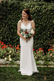 I loved this dress so much! I wore it as my wedding dress for our extremely small wedding a week ago. I'm really petit and short so my grandmother hemmed it a little, shortened the straps a little, and brought it in a little under my arms. With these small modifications the dress fit like a glove. It's the details of this dress that made me love it so much. Like the buttons down the back and the details around the neckline! It isn't see-through at all and the lace is lovely. I was so comfortable and I looked great! - Darcy T.