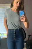 Got this mostly because of the light blue color which was exactly as pictured. However, be aware that this bodysuit looks more so on the casual side - it looks good with high waisted jeans, but I wasn't a fan how it looks with a high waisted skirt since this looks like a regular T-Shirt and a bit too casual for that. Also, it felt a tad too short, I would want it a bit more baggy so it doesn't get all stretched if I lift my arms if you know what I mean. I have just purchased another similar V neck TShirt bodysuit from Lulus in the same exact size, and that one was much better length-wise.
I wasn't sure to return or not, but decide to keep because the color is just so lovely, hard to come across. - Anastasia K.