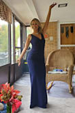 I chose to title this dress as STUNNING because that's what I heard all night at the Wedding I went to. The dress fit so nicely. After reading the reviews of the dress, I chose to go with the XS. When I got the dress, I did choose to get the straps tightened, but it would've been fine if I didn't. It was just a tad loose in the chest area, that's why I chose that route. I absolutely LOVED the dress and didn't want to take it off. I will definitely purchase from Lulus again because the quality of the dress was perfection. My husband loved the dress. I would recommend this dress 100 percent! - Holley J.