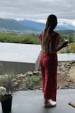 This jumpsuit is as beautiful as I was hoping it would be! Wore it on a long day of wine touring in Japan and it did not disappoint!! I'm usually a size small in dresses, and in between S & M for jumpsuits because of the thighs. I went with a medium for this one and it was perfect, comfortable to walk around in and not extremely tight around the belly area. I am small chested so the top was a little loose but it didn't bother me. Only gave 4 stars because there was a fluke in the v-neck, one side was visibly longer than the other. But again, not a deal breaker. I received so many compliments and I felt great in this jumpsuit!!! - Erin F.