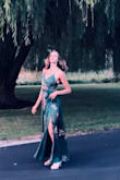 Just wore this to my cousin's wedding. My sister loved it so much she is considering it as her bridesmaids dresses. It's silky with a little weight to it. It feels rich and buttery! Love the green color! - Danielle C.