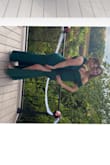 I love this dress! Not only is it a beautiful green, it fit perfectly and was long enough for me to wear heels. The slit was a sexy addition while still staying elegant. So happy with it! - ARIANNA D.