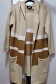 I love the color combination of beige with tan and white stripes. The placement and size of the stripes is just right.
The sleeves are a not full length; they are a couple inches above the wrist. The hood covers my head well and the pockets are a great addition. This neutral cardigan will go well with many colors and is perfect for fall. - Laura D.