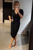 This dress is a slam dunk! I ordered this dress to wear to a Fall wedding. It is form fitting without being too tight, classic but also a little sexy. I got so many compliments from men and women despite being in a sea of women in black dresses. Your figure will look amazing with the wrap design and the jersey material will keep you comfortable all night! - Katy T.