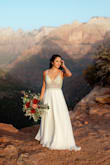 This is the most beautiful dress and was perfect for our elopement in Zion National Park. I loved it immediately online, and was just as impressed when it arrived in person. The detail is gorgeous and I received compliments from everyone, all surprised that I spent $200 on it!
The dress is long, but I had it hemmed to make a small train on the back. The chest cups were slightly big for me, I tried various adhesive bras, but none of them worked well/you could see them as the top of the dress is see-through. In the end I decided not to use any additional chest support and was still happy! The dress does tend to pucker the skin at your armpits, so either be hyper aware and continually readjust it, or just embrace it! Overall, I could not be happier with this. I tried quite a few bridal dresses from lulus (and generally really liked all of them!), but this was perfect, my husband loved it too. Congrats to all brides out there reading this! - Bella B.