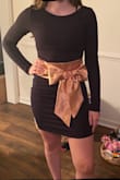 This dress is super cute, can be dressed up like pictured or worn alone and ready for a night out. Love it and it fits perfectly! - Tina S.