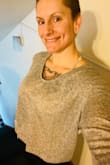 This is so cute! Loose, but still flattering, can be dressed up or down, and is thin (Definitely not for warmth) so it can be tucked in or worn under a fitted jacket. So cute! - Cori S.