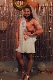 I wore this jacket for a night out during my Bachelorette party and it was comfortable and stylish. I like that it added a bit of pink which ended up matching my sash perfectly. The only thing I was not expecting was the shoulder pads. I have broader shoulders so I didn't need the extra structure but they are small enough that it still worked. Love it!! - Lauren O.