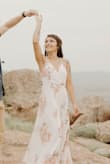 I purchased this dress for my engagement pictures and I absolutely loved it! It is longer but I wore heels and that seemed to help with the length! - Stephanie P.