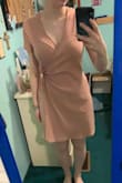 I ordered a size small because I figured I could tie it tighter if it was too loose. The dress is a little too big on me; I would order an X-Small next time. But I'm super happy with this dress and it looks so nice and makes me feel good! - Cassandra W.