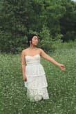 I wore this for my bridal pictures and also for my wedding shower! Got lots of compliments! It fit true to size. I didn't wear a bra and the dress did not slipped down! It kept me feeling pretty and kept me comfortable. - Sun Y.