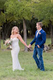 This dress was perfect for my backyard wedding! It was a little long so I had the front shortened and left the back long. I also had boning put in to help the shape. Loved the way it turned out! - Miranda M.
