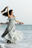This dress was perfect for my beach engagement photoshoot! I love the color and how flowy it is! It was the perfect dress for me! - Albina B.