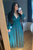 Always a risky move to buy something that doesn't have a model photo or reviews but this dress is a very soft tulle feel and is definitely one of my favorite new dresses!! So flattering! Only bad this its a wide deep V neck so I will get it sewed in the middle - using it for my engagement photos! I got a size large - Ariana P.