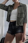 Comfy, smooth material that is perfect for mild transitional fall weather. Good quality, a little pricey for a very thin jacket that's more like a shirt, but I think I'll be wearing it often enough to make up for that because it's so cute. Love the color too - Chantal C.
