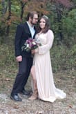 Bought this to wear in my elopement. Perfect color. Sleeves are detailed and pretty. Flattering. I had to find sticky petals to cover my nips. It was very long on me, but it went with my look. - Veronica H.