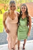 I wore this dress to my sisters wedding and received compliments all day! I am curvy, and this dress was very flatting and hugged me in all the right spots! I just ordered it in green :-) - Michelle W.