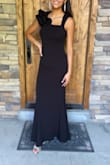 Fit was amazing. Has a little stretch to the fabric. - Heather R.