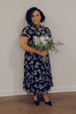 Very chic and fits nicely. It is a little long on me because I'm 5'5" and I think it hit mid shin, but it still looks very elegant. - Cecile B.