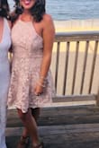 Charming dress, a little more blush/pink than the picture shows. Nicely made dress. - Brittany S.