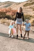 I love this skirt! I paired it with the Lulus Basic Scoop Back Bodysuit in black. The skirt feels high quality and I love the corduroy detail. True to size for me and I plan to buy the green one as well. - Amy A.
