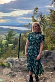 I bought this dress to wear to a friend's wedding and absolutely love it! I would say it is just a tad big, as it doesn't fit my waist the way I would like, but a quick pin in the back fixed that. Definitely size down if you are shorter or have a small waist. - Gini B.