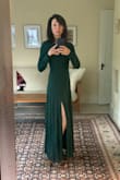 I purchased this dress to wear for a fall wedding - fabric is soft and on the thicker side (not too sheer), hangs and hugs without being clingy. Gotten rave reviews from family and significant others - can't wait to wear! - Kristen S.