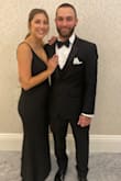 I bought two sizes, small and medium, just in case one didn't fit. I ended up going with the small and it was absolutely perfect! Extremely flattering and the fabric is stretchy, sturdy and very forgiving, even after a meal and many drinks. Great investment because I can wear it to every wedding going forward! Enjoy me and my handsome man. - Courtney M.