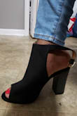 I have a very wide foot, almost all the shoes I have to go a 1/2 size up. These fit perfect. I'm glad I finally found opened-toe booties that I can fit.
 And they look great! - Ciara G.