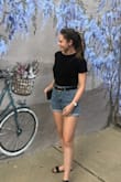 Its so nice to have a basic look that stays tucked in and not have to worry about it ally day. It is definitely a touch large and it does not shrink in the wash. Super super soft material!! (the whole outfit is from lulus though!) - Caitlin S.