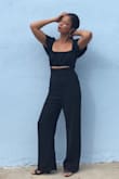 I love how this black jumpsuit fits me except  It was long but not a big deal. I shortened the leg hem to fit my height.  Great quality too! XOXO - Zarah M.